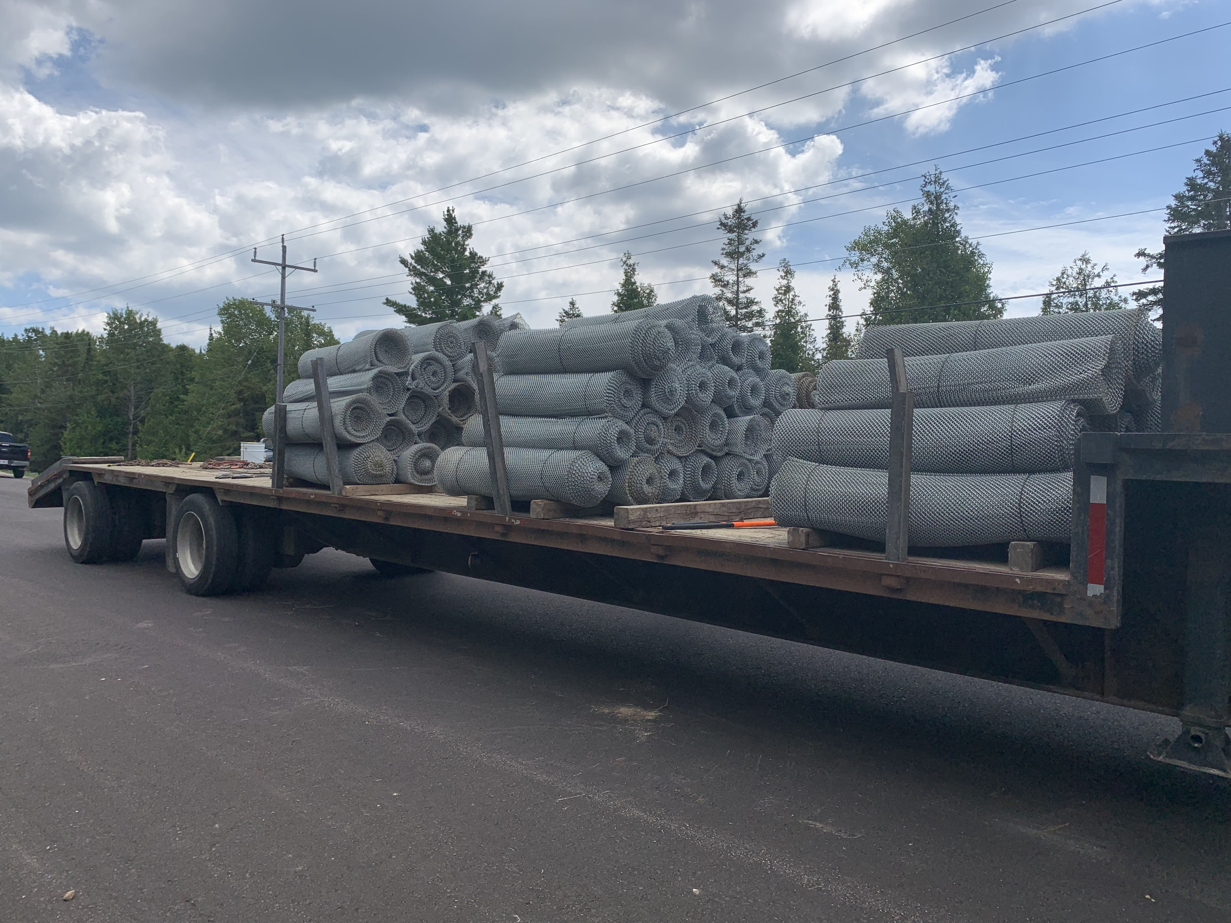 Photo of fencing being placed on a truck for SON's use